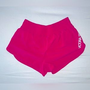 Bright pink Victorias Secret workout shorts